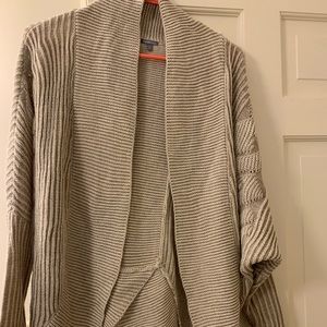 Never worn, tan cardigan, size medium!